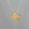 Vögelchen und Kette, gold